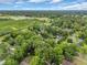 Expansive aerial view of a residential community surrounded by greenery and trees at 1108 Chicora Blvd., Conway, SC 29526