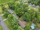 Aerial shot showcasing a home with a backyard trampoline and pool at 1108 Chicora Blvd., Conway, SC 29526