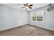 Bright bedroom with carpet, ceiling fan, and closet providing comfort and functionality at 1108 Chicora Blvd., Conway, SC 29526