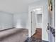 Light-filled living room with neutral paint and carpet with an entry hallway and unique tiled foyer at 1108 Chicora Blvd., Conway, SC 29526