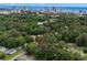 Aerial view showing this tree-covered community, near the beach, with city views in the distance at 1111 King St., Myrtle Beach, SC 29577