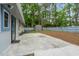 The spacious backyard has a patio, shed, and blue fence, providing privacy and outdoor space at 1111 King St., Myrtle Beach, SC 29577