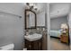 Well-lit bathroom showcasing modern vanity, mosaic tiles, and convenient layout at 1111 King St., Myrtle Beach, SC 29577