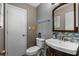 Stylish bathroom featuring a modern sink, decorative backsplash, and neutral wall colors at 1111 King St., Myrtle Beach, SC 29577