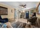 Open living room featuring comfortable seating, tiled floor, and adjacent entry and kitchen areas at 1111 King St., Myrtle Beach, SC 29577