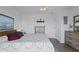 Inviting bedroom with floral bedding, decorative accents, and light wood furniture creates a warm, comfortable space at 120 Dogwood Dr. N # 209, Murrells Inlet, SC 29576
