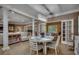 Spacious dining room with decorative chandelier and views into other living spaces at 1204 Pine Valley Rd., North Myrtle Beach, SC 29582