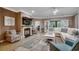Comfortable living space showcasing a fireplace, tile flooring, and ample seating perfect for relaxation at 1204 Pine Valley Rd., North Myrtle Beach, SC 29582