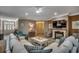 Spacious living room with plush seating, fireplace, and open floor plan perfect for entertaining at 1204 Pine Valley Rd., North Myrtle Beach, SC 29582