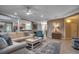 Open-concept living area with tile flooring, a ceiling fan, and access to the kitchen and dining area at 1204 Pine Valley Rd., North Myrtle Beach, SC 29582