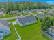Residential street in a quiet neighborhood surrounded by mature trees and well-kept lawns at 125 Balsa Dr., Longs, SC 29568