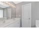 Bathroom vanity area with double sinks, a big mirror, and sufficient lighting at 125 Balsa Dr., Longs, SC 29568