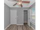 A well-lit bedroom with a closet for storage and a ceiling fan for comfort at 125 Balsa Dr., Longs, SC 29568