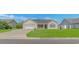 Charming single-story home with a well-manicured lawn and attached two car garage at 125 Balsa Dr., Longs, SC 29568