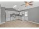 Well-equipped kitchen with white cabinets, tile flooring, and plenty of natural light at 125 Balsa Dr., Longs, SC 29568