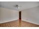 Cozy bedroom featuring hardwood floors and a closet with mirrored doors at 1261 Parkhill Dr., Conway, SC 29526