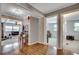 This hallway features wood floors and multiple entryways into the various rooms of the house at 1261 Parkhill Dr., Conway, SC 29526