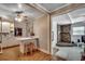 View of the kitchen with bar stool seating that opens up to the living room at 1261 Parkhill Dr., Conway, SC 29526