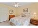 Bedroom with ceiling fan, dresser, and mirror above the dresser in the room at 127 Pinfeather Trail, Myrtle Beach, SC 29588