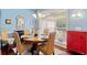 Cozy dining room with a round table, woven chairs, and a bright window for cheerful meals at 127 Pinfeather Trail, Myrtle Beach, SC 29588