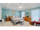 Main bedroom with trey ceiling, neutral walls, and ensuite bathroom at 127 Pinfeather Trail, Myrtle Beach, SC 29588