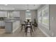 Bright breakfast nook showcasing modern flooring, natural light, and a breakfast bar at 1307 Collins Park St., Conway, SC 29526