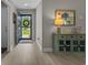 Bright entryway featuring modern flooring, calming paint colors, and a charming side table at 1307 Collins Park St., Conway, SC 29526