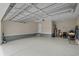 Spacious garage with epoxy floors, ample storage space, and a door to the backyard at 1307 Collins Park St., Conway, SC 29526