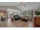 Open-concept living room featuring modern flooring, vaulted ceilings, and an abundance of natural light at 1307 Collins Park St., Conway, SC 29526