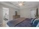 Bright main bedroom with en-suite bathroom access at 1307 Collins Park St., Conway, SC 29526