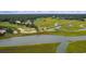 Scenic aerial view of golf course homes, bridge, marsh and winding waterways at 141-4 Weehawka Way # 4, Pawleys Island, SC 29585