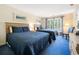 This bedroom features two queen beds, a window with curtains, and a dresser with a TV at 141-4 Weehawka Way # 4, Pawleys Island, SC 29585