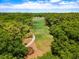 Aerial view of a beautiful golf course with lush green fairways and trees at 141-4 Weehawka Way # 4, Pawleys Island, SC 29585
