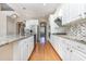 Well-equipped kitchen with granite countertops, stainless steel appliances and hardwood floors at 1549 Kensington Ln., Myrtle Beach, SC 29577