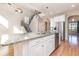 Granite kitchen island featuring stainless steel appliances and hardwood floors at 1549 Kensington Ln., Myrtle Beach, SC 29577
