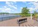 Scenic lake view from the community area with seating at 1549 Kensington Ln., Myrtle Beach, SC 29577