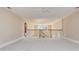 Open loft area with carpet flooring and decorative railings overlooking the living space at 1549 Kensington Ln., Myrtle Beach, SC 29577