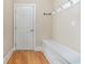 Welcoming mudroom with hardwood floors, built-in bench, and coat hooks at 1549 Kensington Ln., Myrtle Beach, SC 29577