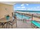 Relaxing balcony with seating area, perfect for enjoying the ocean view at 1620 N Waccamaw Dr. # 103, Garden City Beach, SC 29576