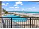 Stunning view from the balcony overlooking the beach and pool at 1620 N Waccamaw Dr. # 103, Garden City Beach, SC 29576