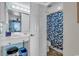 Bathroom features a vanity with access to the private toilet and shower at 1620 N Waccamaw Dr. # 103, Garden City Beach, SC 29576