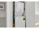 Efficient laundry room features stacked washer and dryer maximizing space and convenience at 1620 N Waccamaw Dr. # 103, Garden City Beach, SC 29576