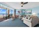 Cozy living room with ocean views, comfortable seating, and beach-themed decor at 1620 N Waccamaw Dr. # 103, Garden City Beach, SC 29576