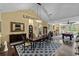 Open-concept space with a dining table, a pool table, and dark hardwood flooring at 1763 Hemingway Rd., Loris, SC 29569