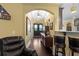 Inviting entryway with chandelier, hardwood floors, and beautiful doorway at 1763 Hemingway Rd., Loris, SC 29569