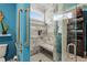 Accessible shower with grab bars, a built-in bench, and tiled walls for easy maintenance at 1763 Hemingway Rd., Loris, SC 29569