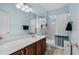 This full bathroom has tile floors, vanity sink, and a shower-tub combo at 190 Barony Pl., Pawleys Island, SC 29585