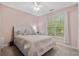 Inviting bedroom with a cozy ambiance, featuring natural light and neutral tones at 190 Barony Pl., Pawleys Island, SC 29585
