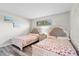 Inviting bedroom with two twin beds, upholstered headboards, and bright decor at 2000 Greens Blvd. # 40C, Myrtle Beach, SC 29577