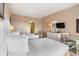 Bedroom featuring two beds, a television, and a view into the bathroom at 201 Ocean Blvd. S # 1505, North Myrtle Beach, SC 29582